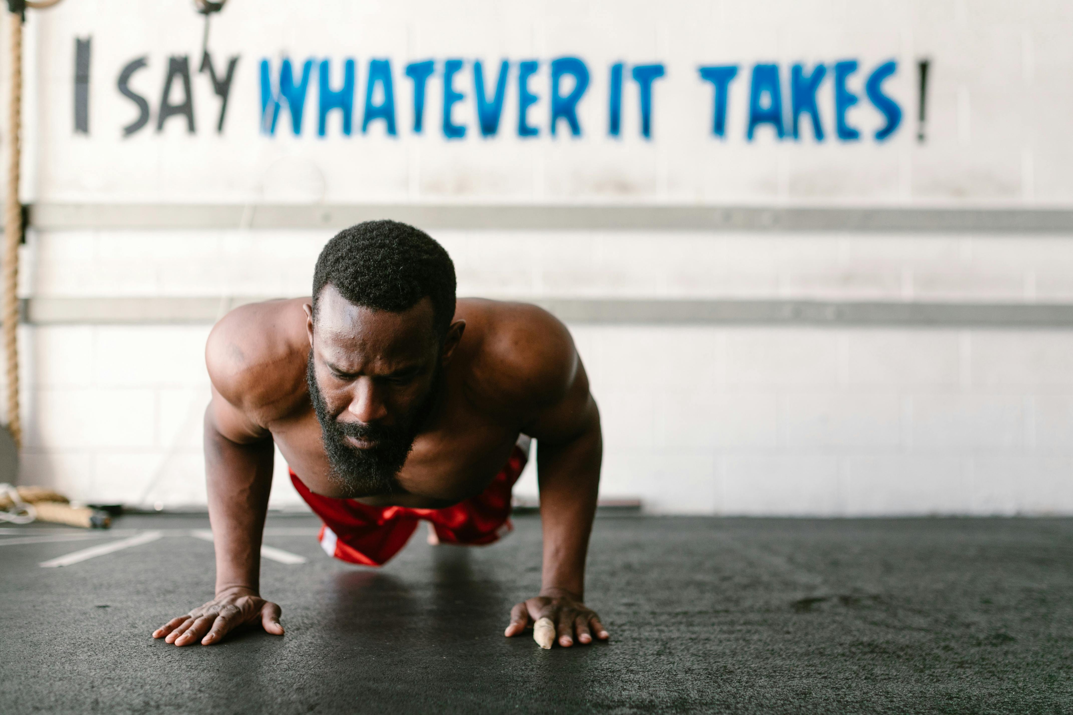 Man doing push-up exercise, building strength and resilience