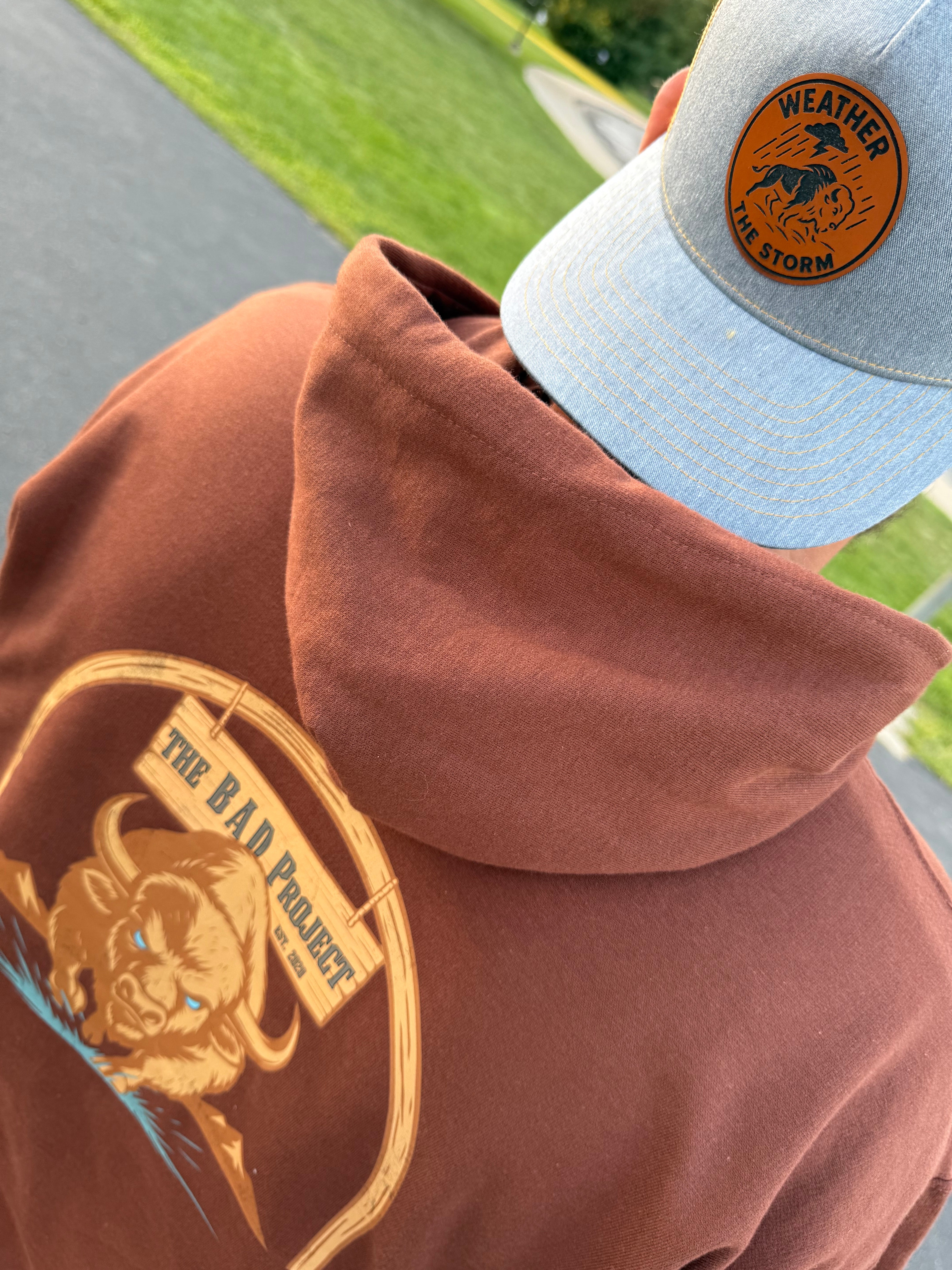 buffalo image on hoodie with hat weather the storm