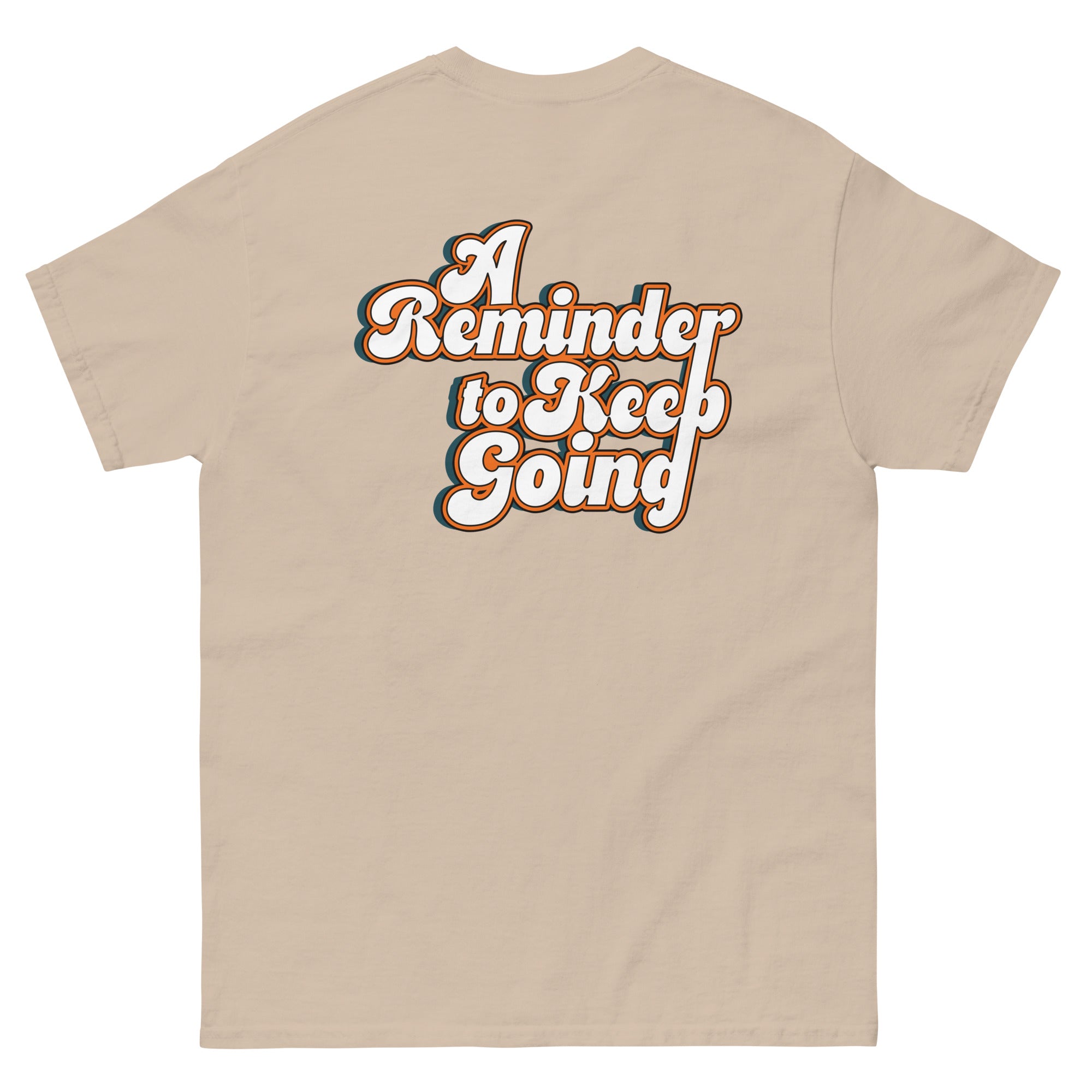 Beige t-shirt with 'A Reminder to Keep Going' text design on a white background