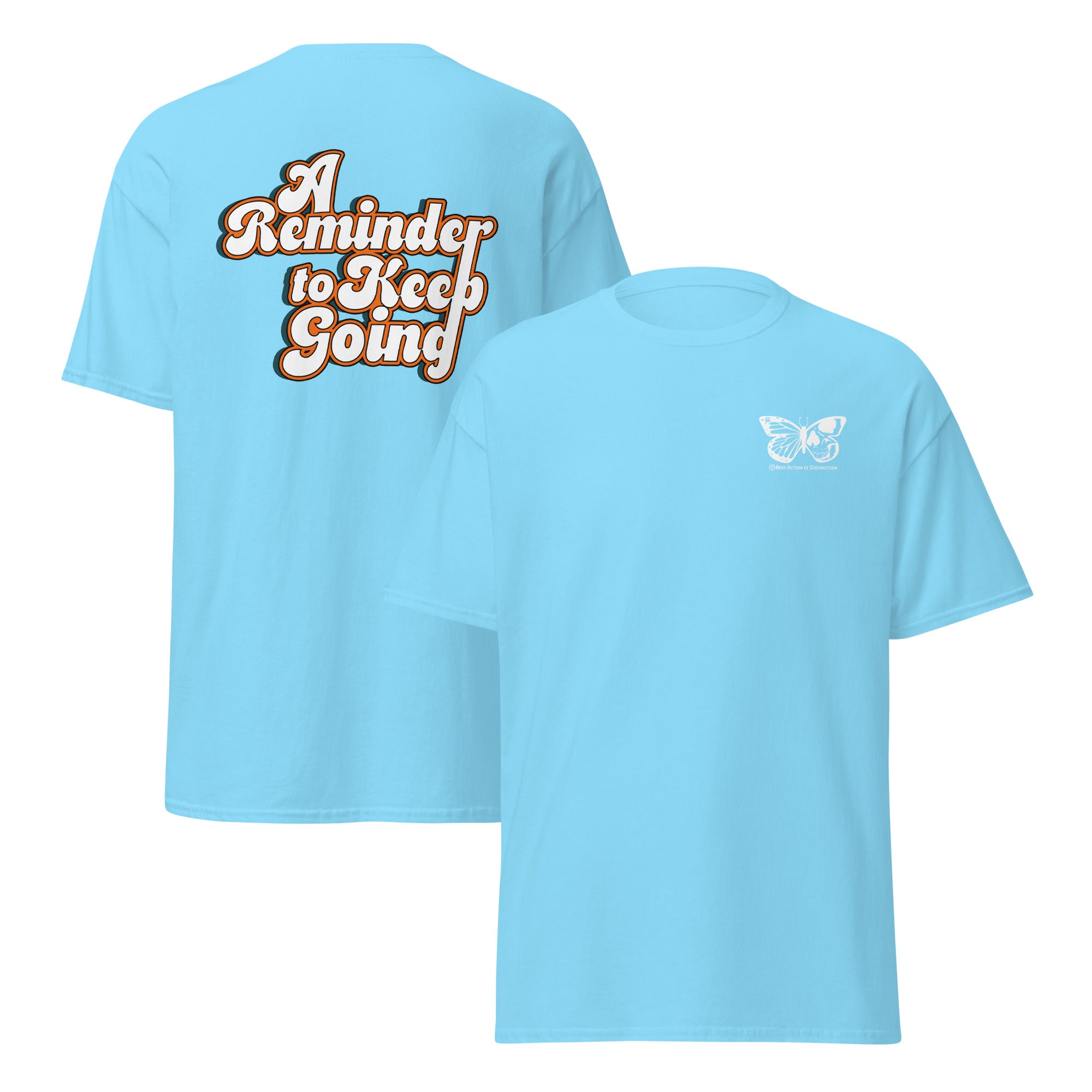 Light blue t-shirt with text 'A Reminder to Keep Going' on the front and a butterfly design on the back.