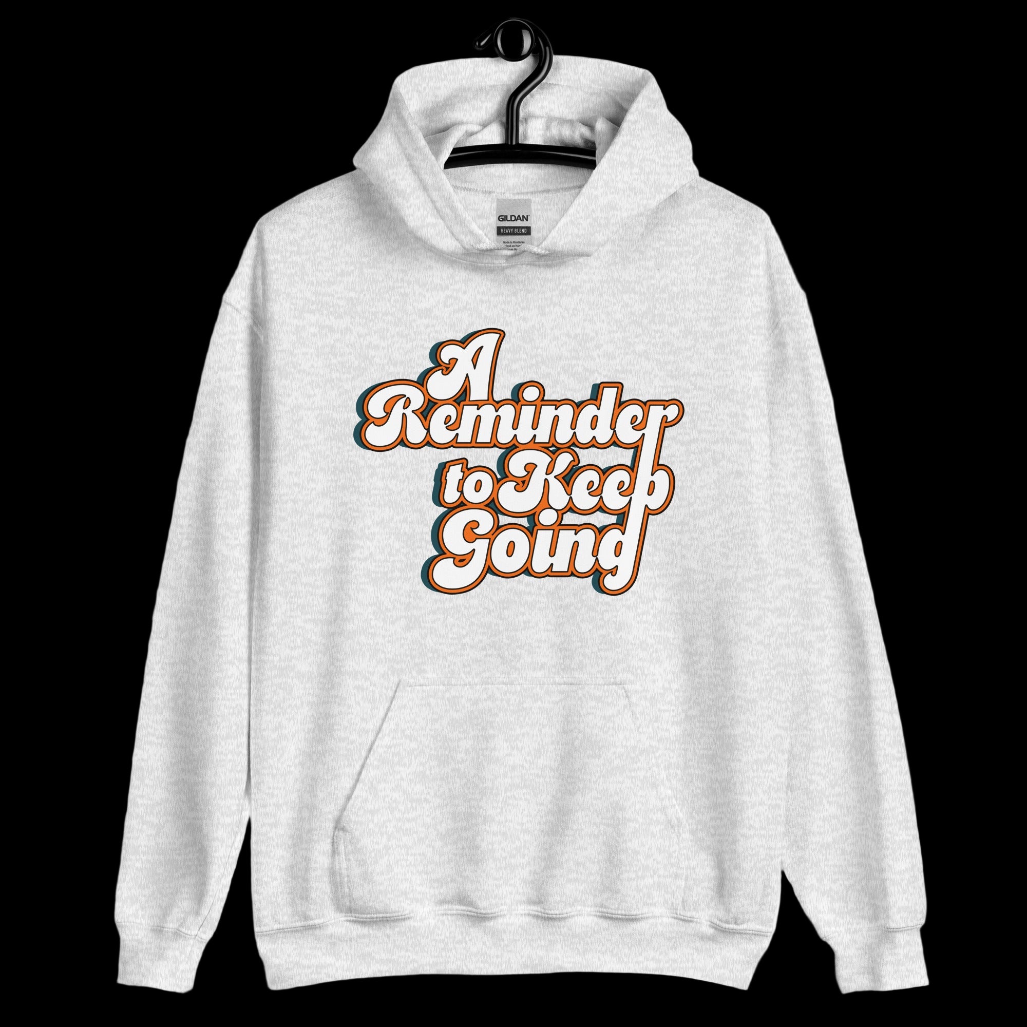 White hoodie with 'A Reminder to Keep Going' text on a white background